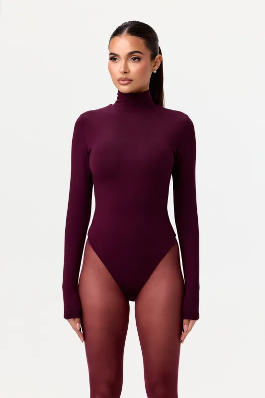Butter Turtleneck Contour Bodysuit sold by Naked Wardrobe