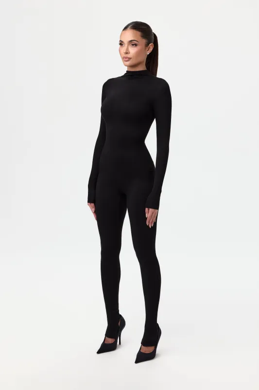 Smooth Stirrup Jumpsuit sold by Naked Wardrobe
