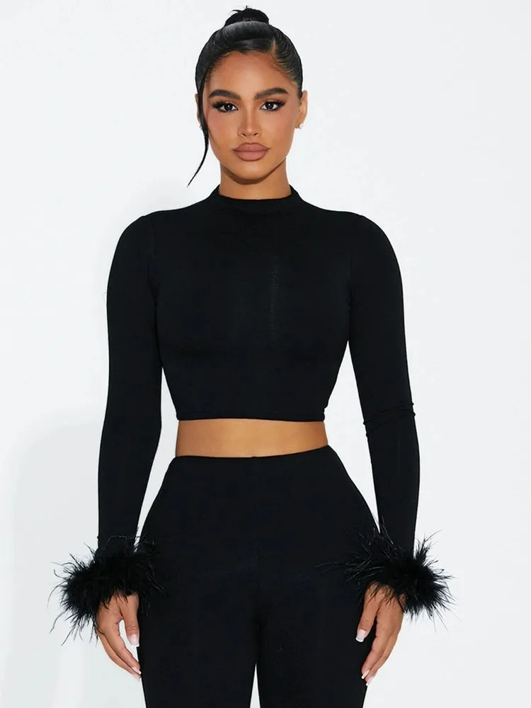 Butter Long SLeeve Micro Crop Top w/ Feather sold by Naked Wardrobe