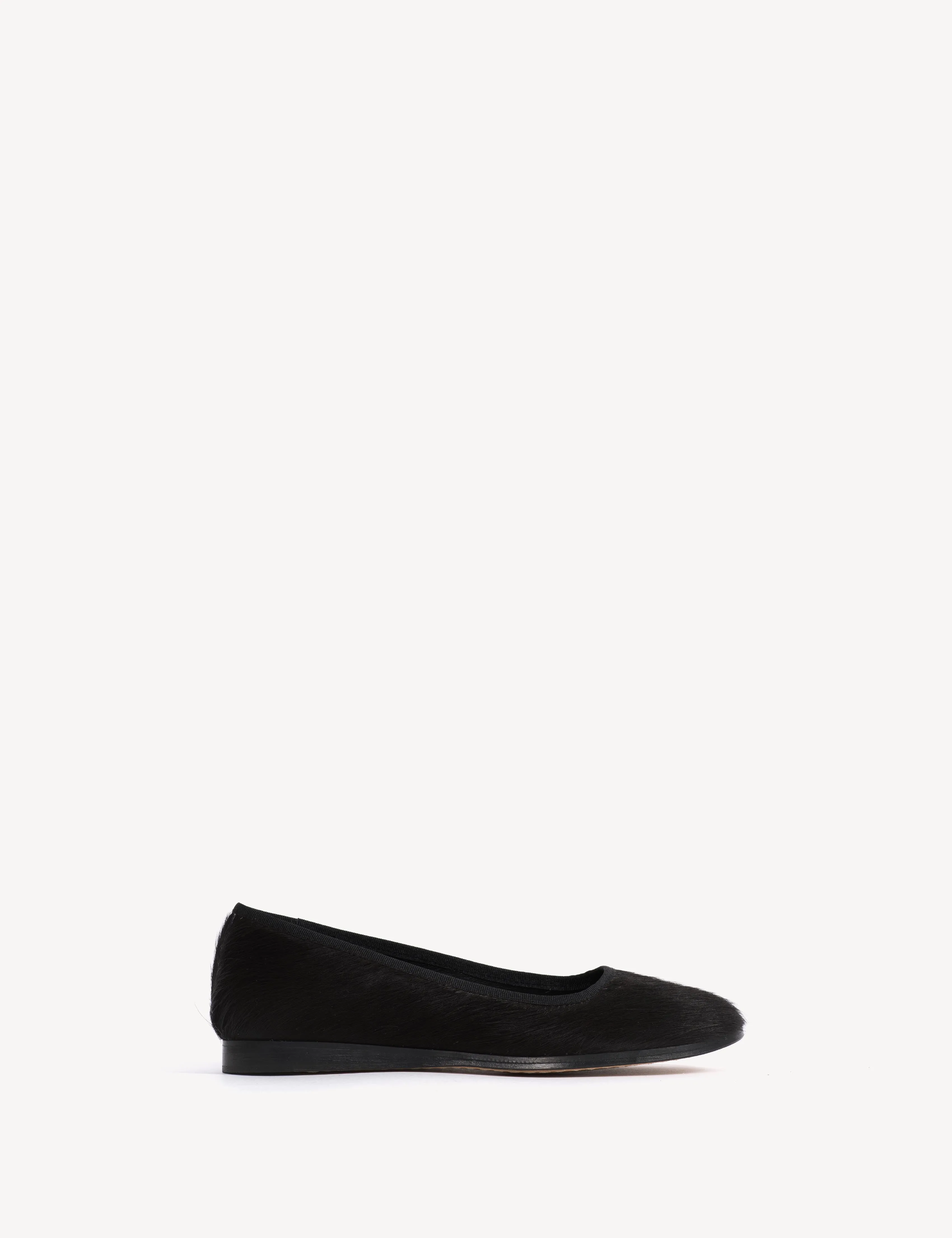 Mari Flats In Black Cow Fur sold by DICO Copenhangen