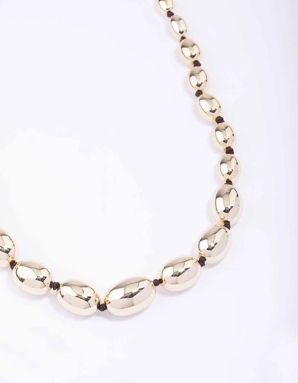 Gold Oval Bead Graduating Cord Necklace sold by lovisa