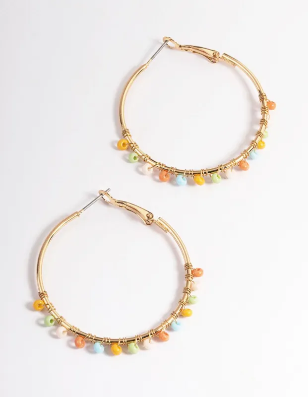 Gold Boho Bead Droplet Hoop Earrings sold by lovisa