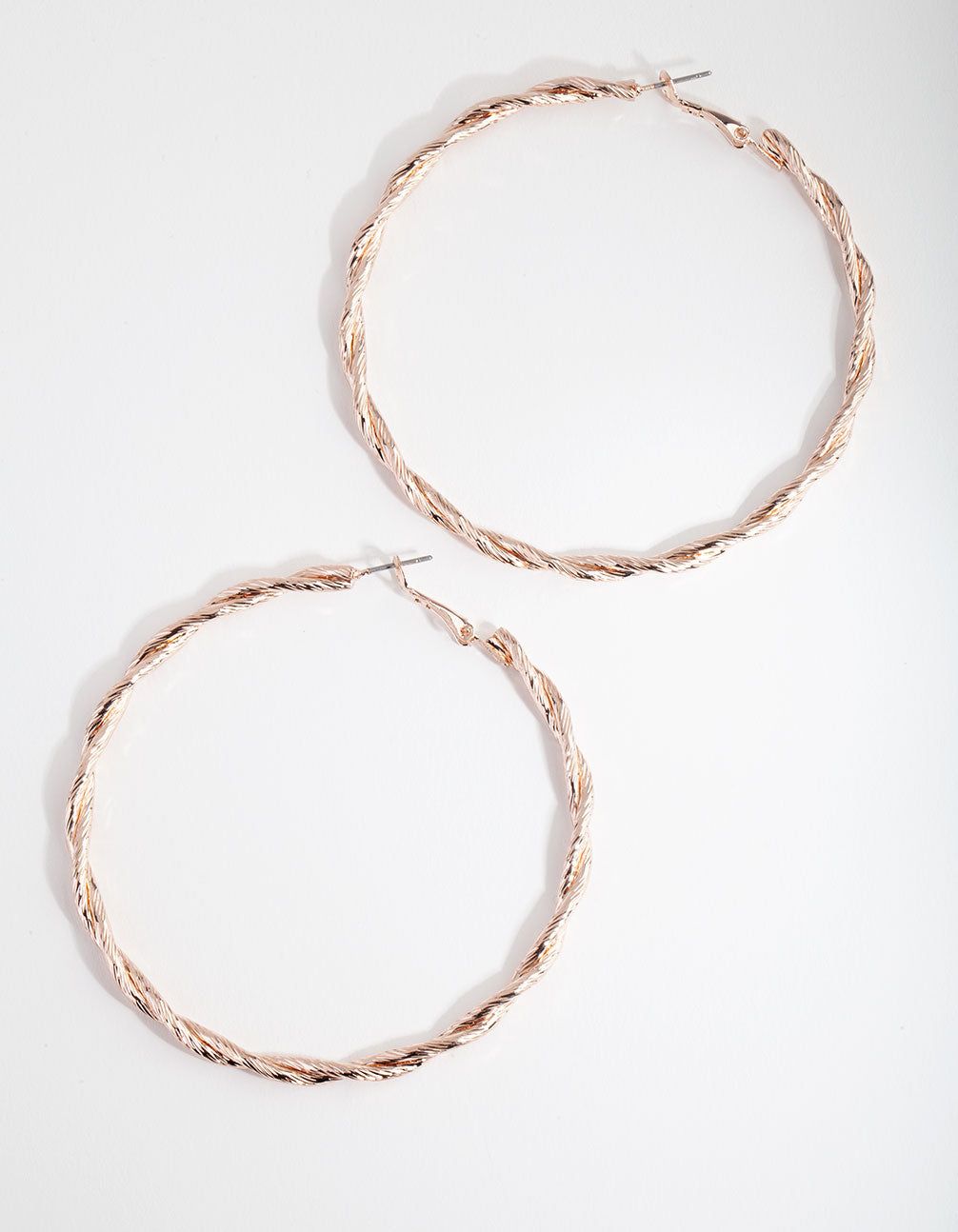 Rose Gold Double Twist Hoop Earrings sold by lovisa