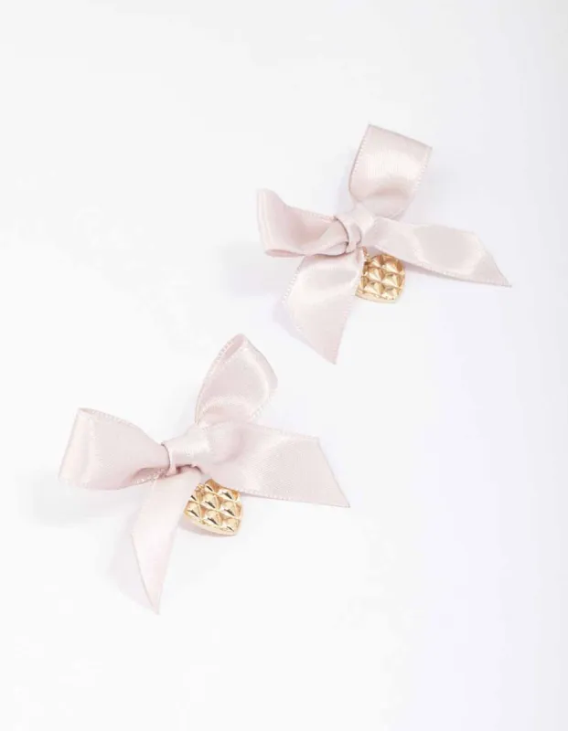 Pink & Gold Textured Bow Heart Earrings sold by lovisa