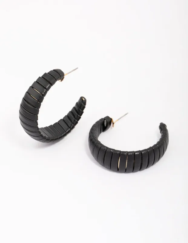 Black Faux Leather Wrapped Hoop Earrings sold by lovisa