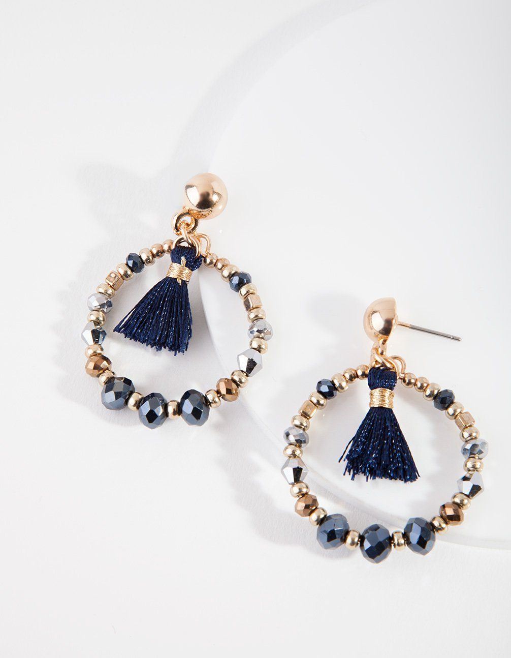 MIDN SG BD CIRC TASSL DRP ER sold by lovisa