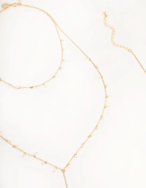 Gold Dainty Pearl Body Chain sold by lovisa
