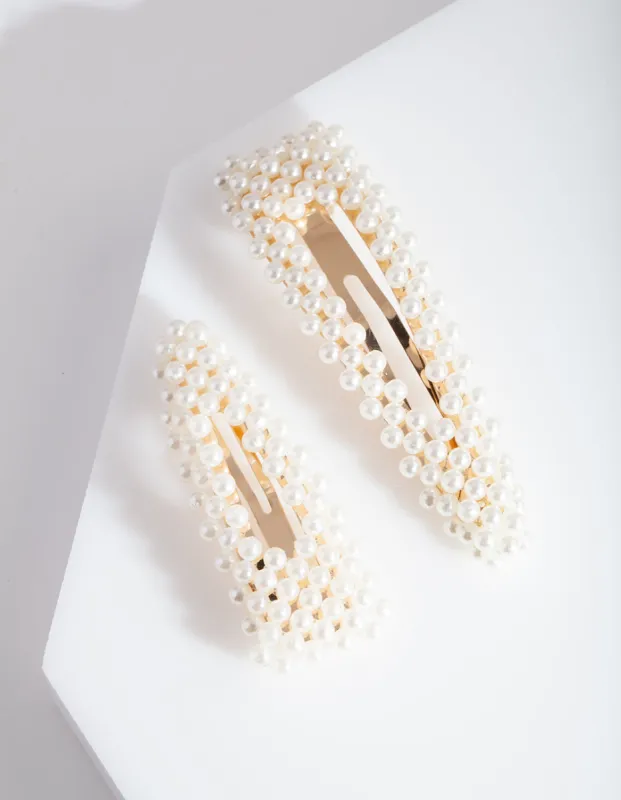 Gold Pearl Triangle Hair Clip Duo sold by lovisa