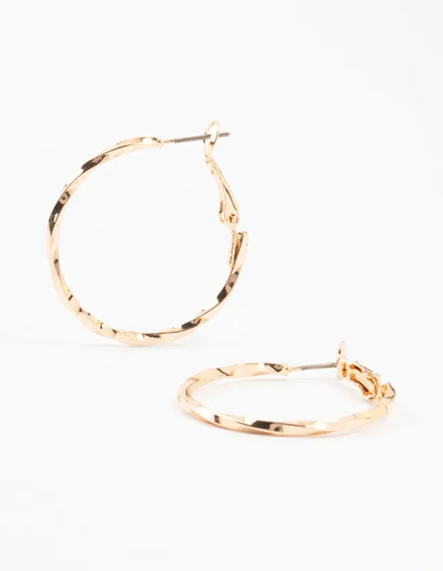Gold Thin Hammered Hoop Earrings sold by lovisa