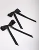 Black Fabric Satin Scallop Hair Bow Pack sold by lovisa