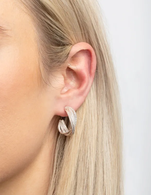 Rhodium Mini Criss Cross Hoop Earrings sold by lovisa