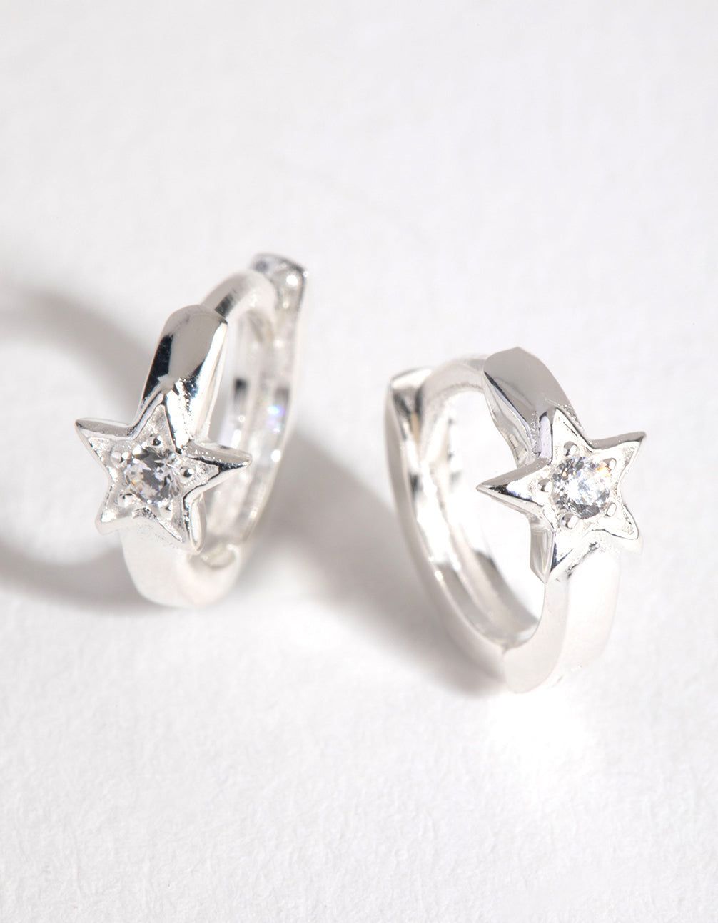 Sterling Silver Diamond Cut Star Huggie Earrings sold by lovisa