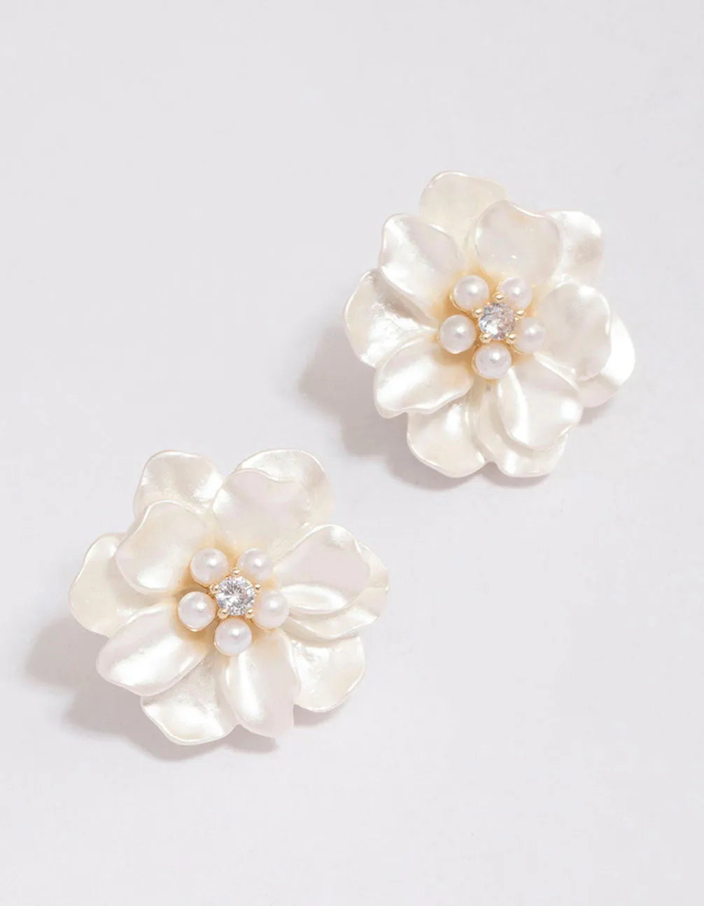 Gold Plated White Flower Cubic Zirconia Stud Earrings sold by lovisa