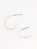 Silver Hammered Huggie Earrings sold by lovisa
