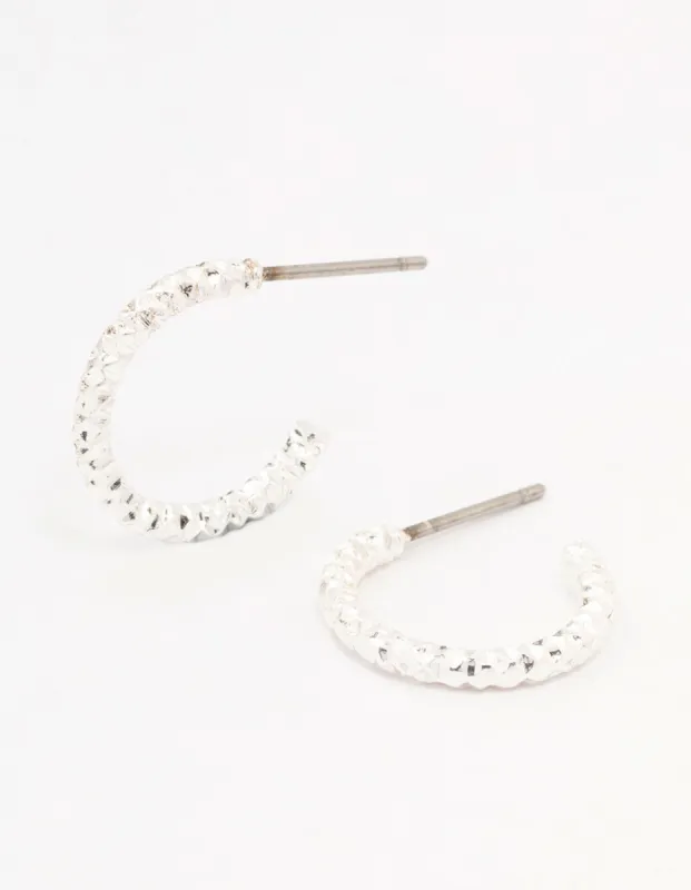 Silver Hammered Huggie Earrings sold by lovisa
