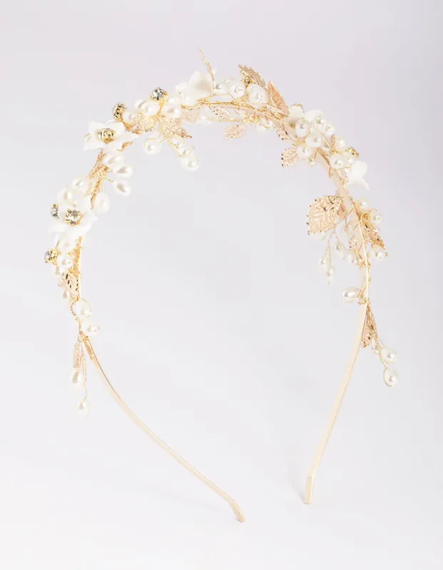 Gold Flower & Leaf Headband sold by lovisa