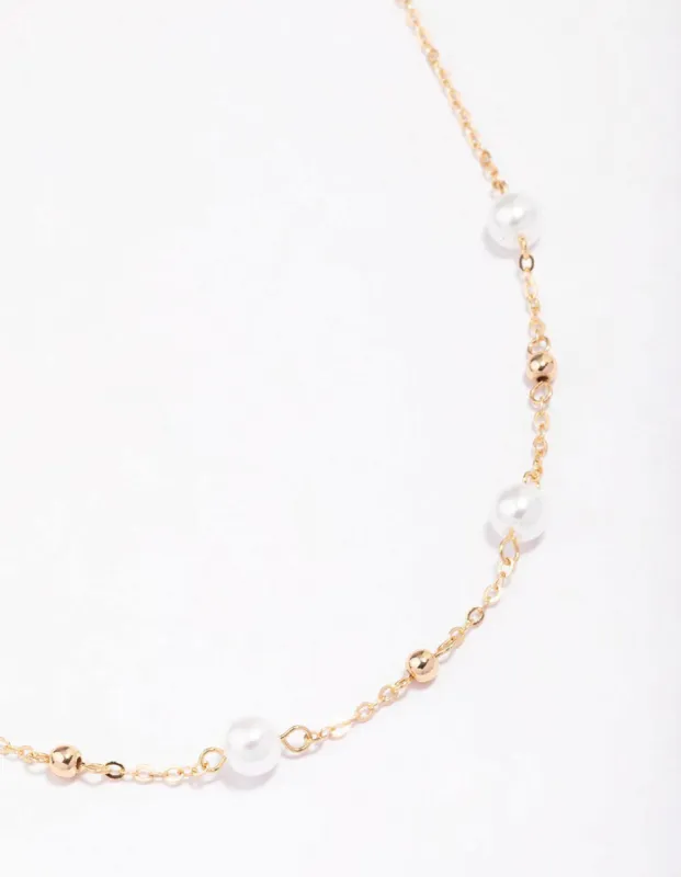 Gold Pearl & Ball Station Necklace sold by lovisa