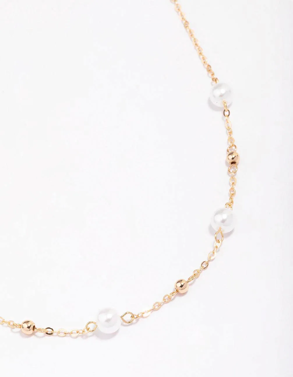 Gold Pearl & Ball Station Necklace sold by lovisa