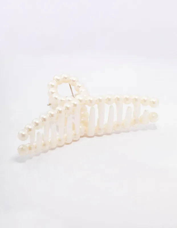 Cream Pearl Twisted Hair Claw Clip sold by lovisa