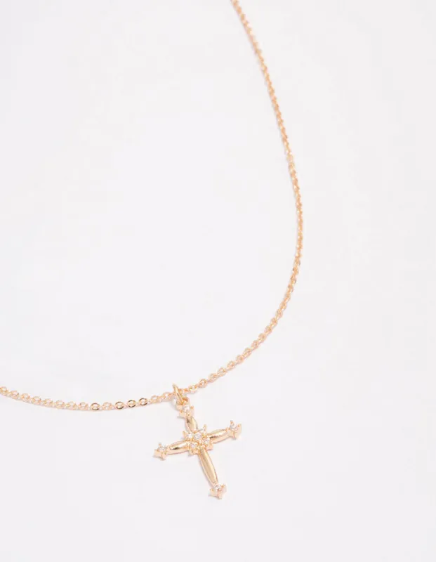 Gold Ornate Diamante Cross Pendant Necklace sold by lovisa