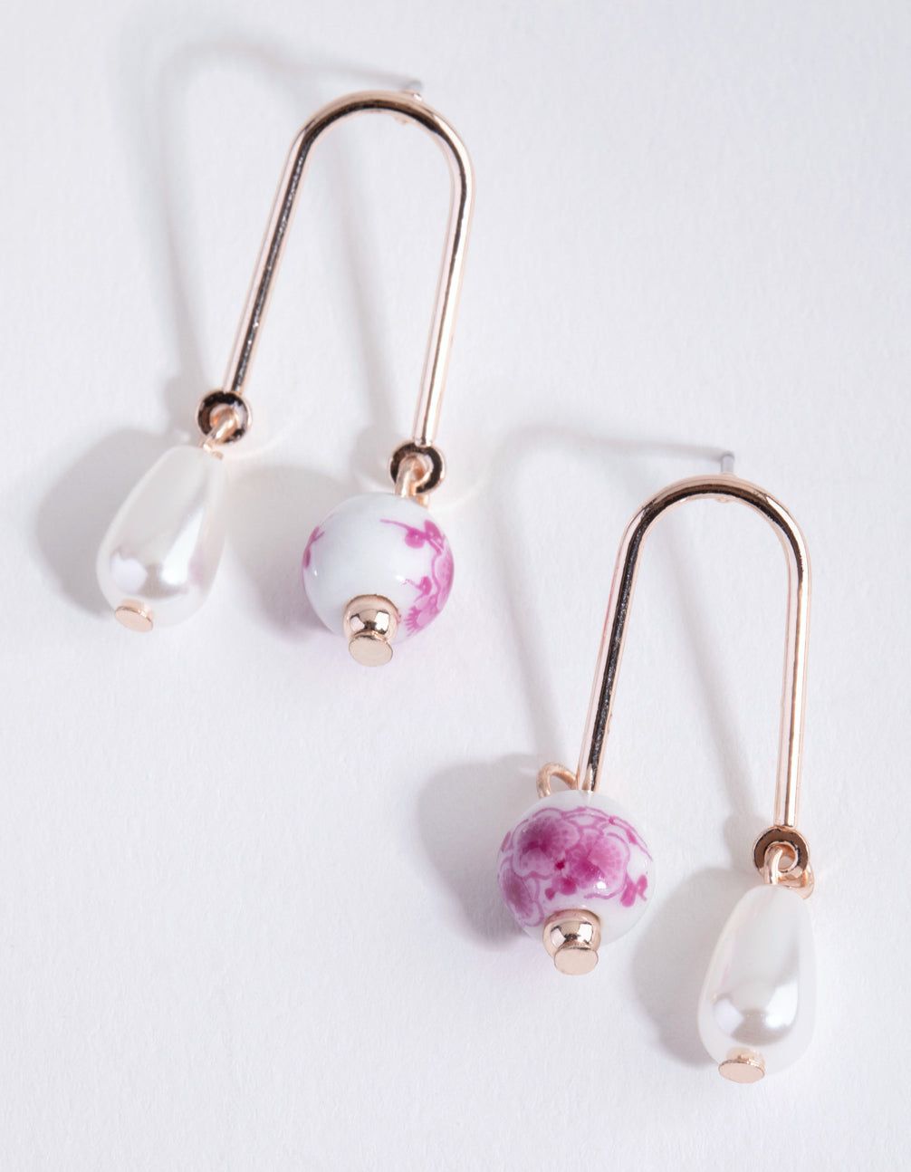 Rose Gold Flower Ball Faux Pearl Drop Earrings sold by lovisa