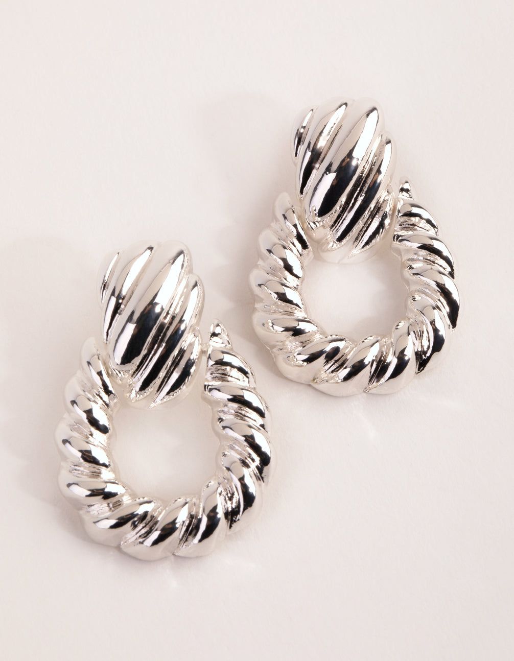 Silver Plated Twisted Earrings sold by lovisa