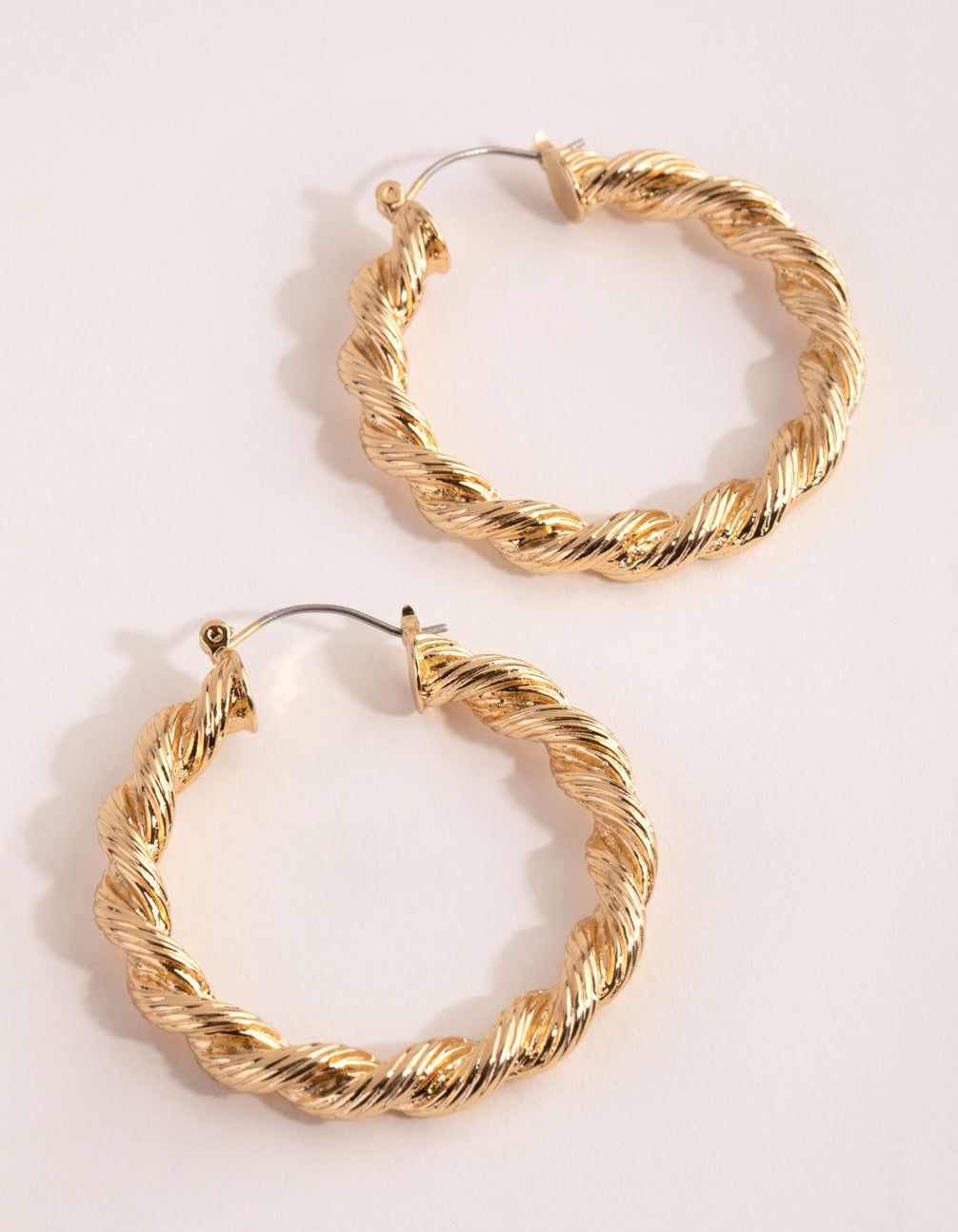 Gold Plated Large Twist Hoop Earrings sold by lovisa