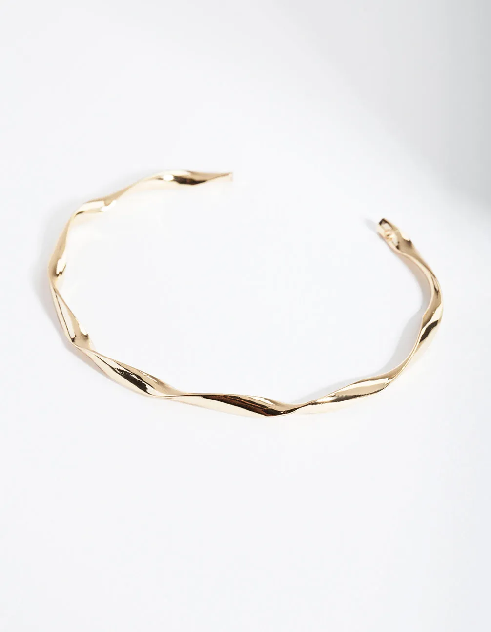 Gold Plated Twist Bangle sold by lovisa