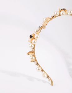 Gold Pearl & Flower Alice Band sold by lovisa