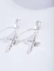 Silver Diamante Cross Huggie Earrings sold by lovisa