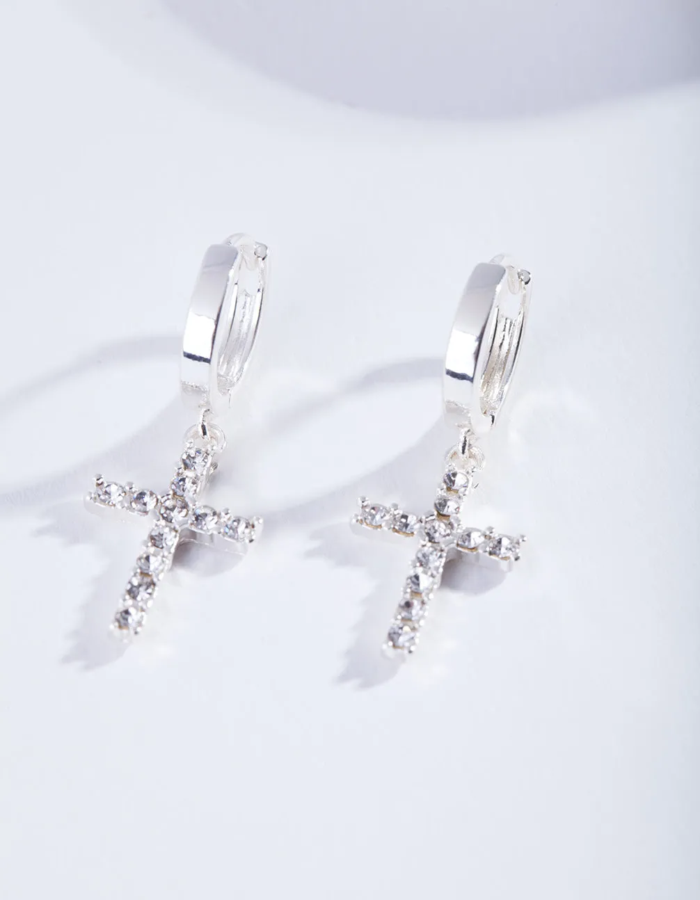 Silver Diamante Cross Huggie Earrings sold by lovisa