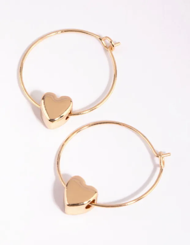 Gold Threaded Heart Charm Huggie Hoop Earrings sold by lovisa
