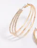 Gold Medium Triple Row Diamante Hoop Earrings sold by lovisa