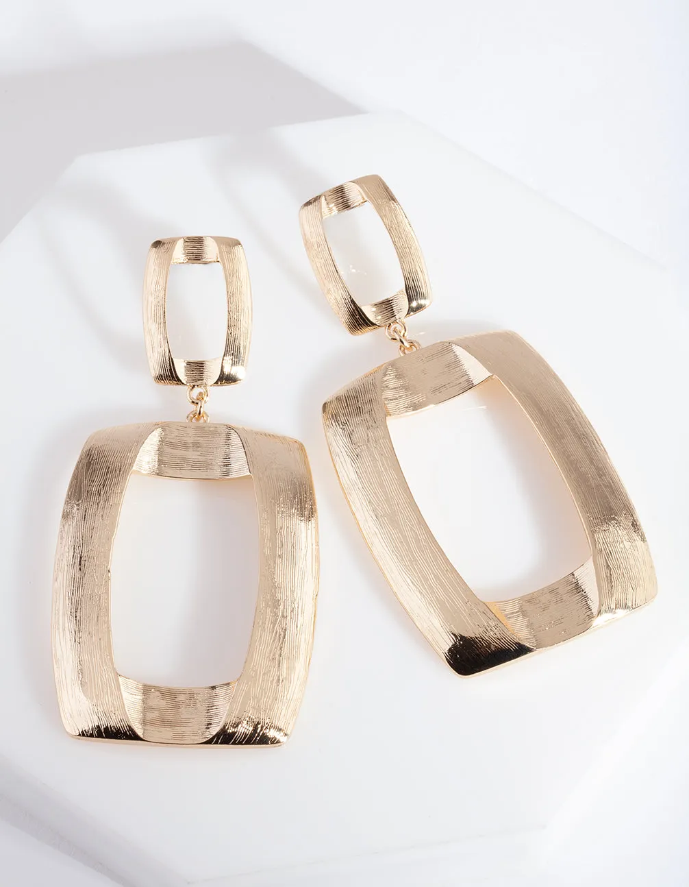 Gold Textured Open Geometric Drop Earrings sold by lovisa