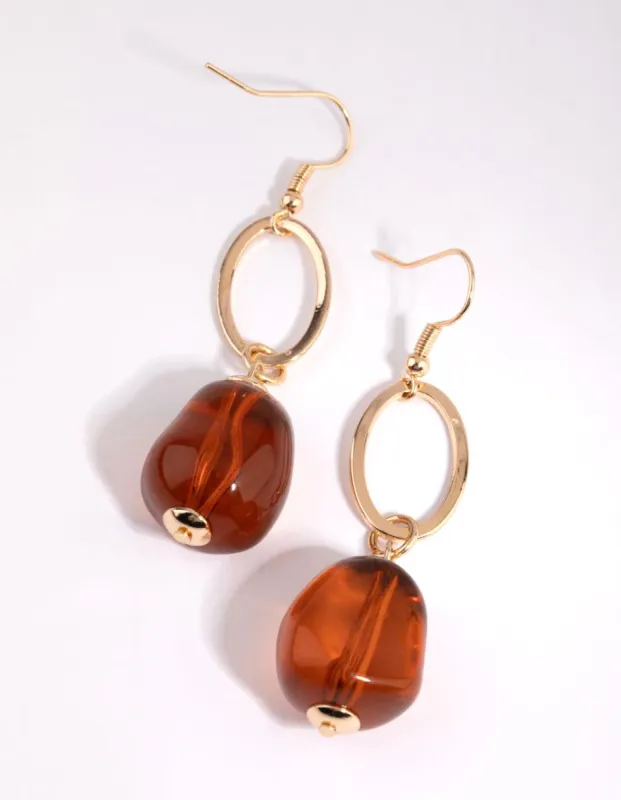Gold Open Oval Brown Bead Earrings sold by lovisa
