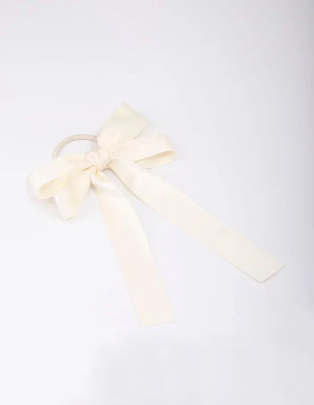 Large Cream Bow Hair Tie sold by lovisa