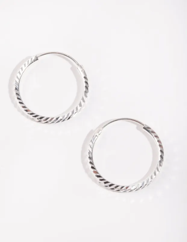 Sterling Silver 20mm Diamond Cut Hoop Earrings sold by lovisa