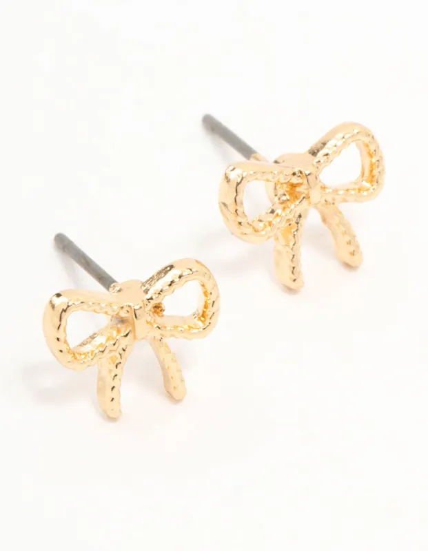 Gold Twisted Bow Stud Earrings sold by lovisa