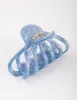 Blue Acrylic Round Cut Out Claw Clip sold by lovisa