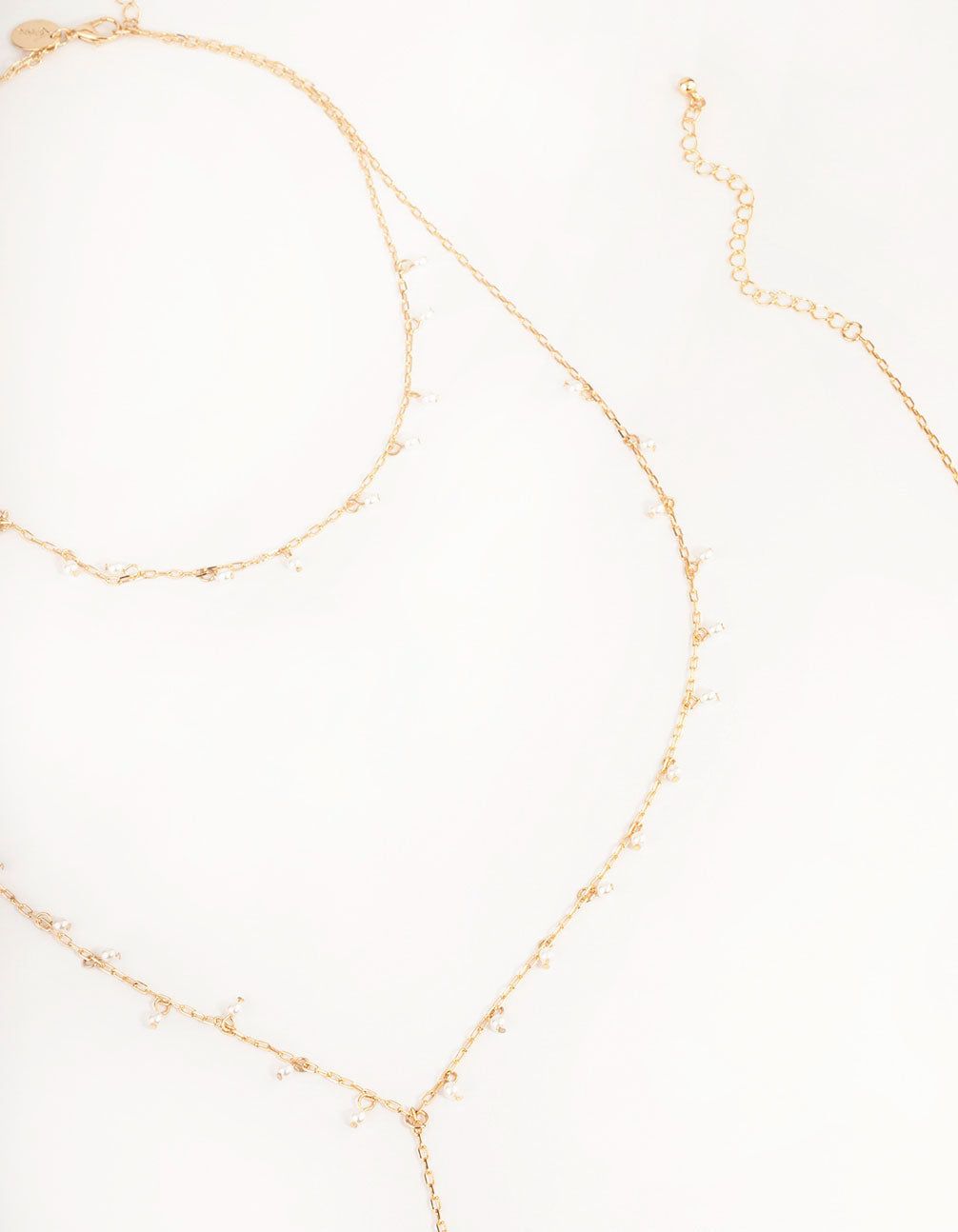 Gold Dainty Pearl Body Chain sold by lovisa