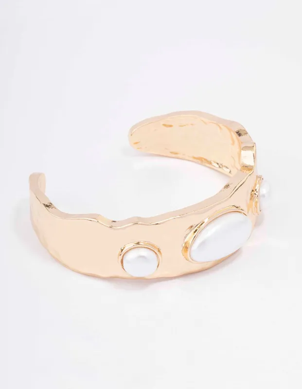 Gold Oval Pearl Wrist Cuff sold by lovisa