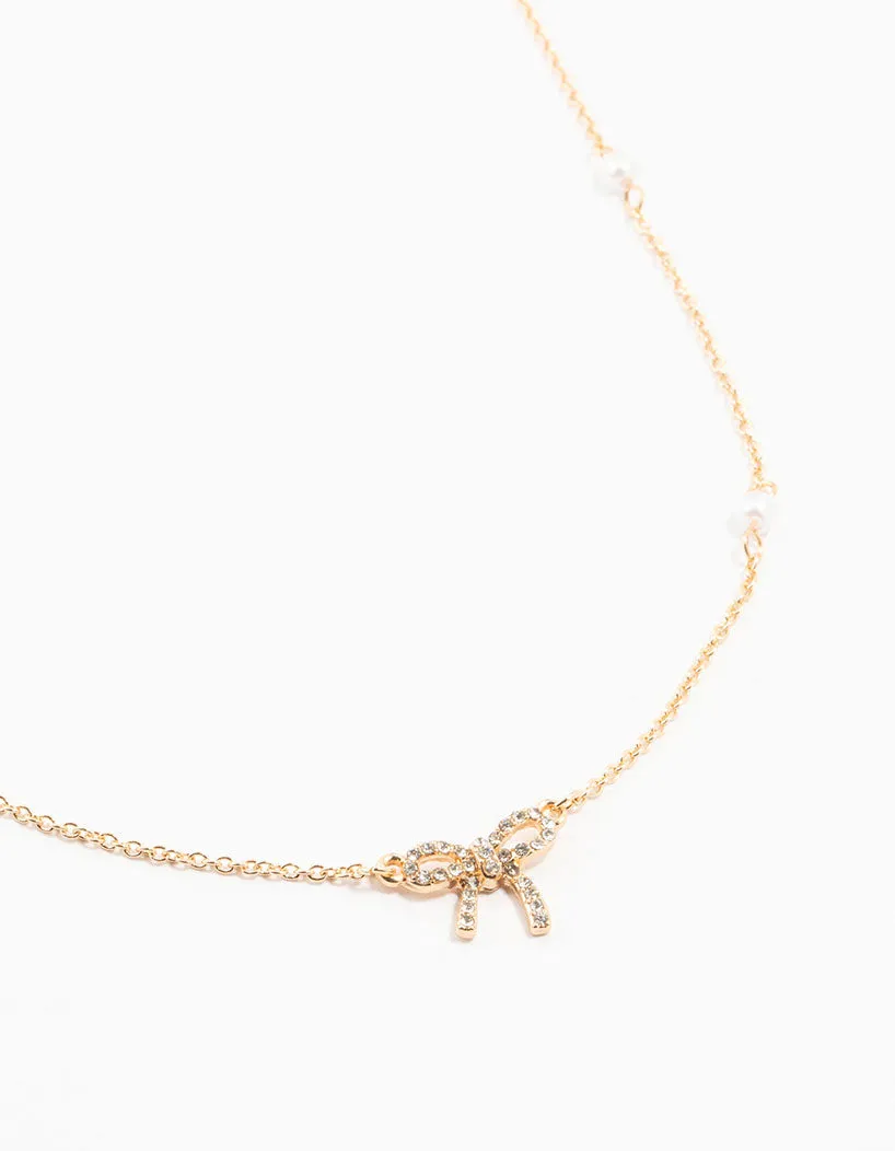 Gold Station Pearl Diamante Bow Necklace sold by lovisa