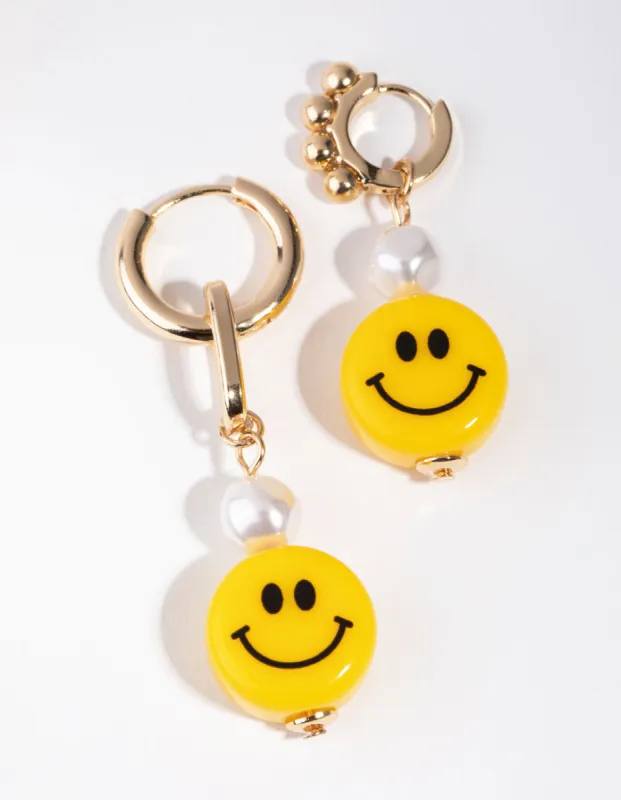 Gold Asymmetrical Pearl Smiley Drop Earrings sold by lovisa