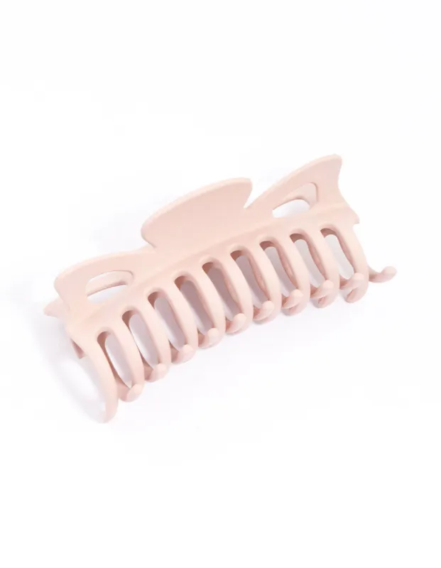 Blush Acrylic Triangular Cut Out Claw Clip sold by lovisa