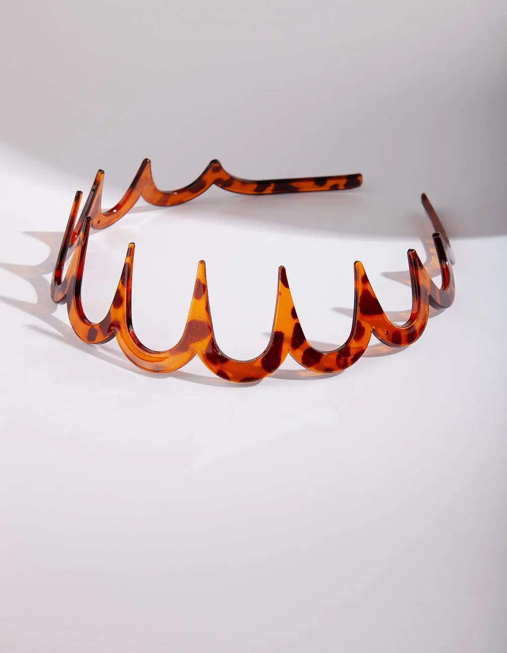 Tortoiseshell Wave Headband sold by lovisa