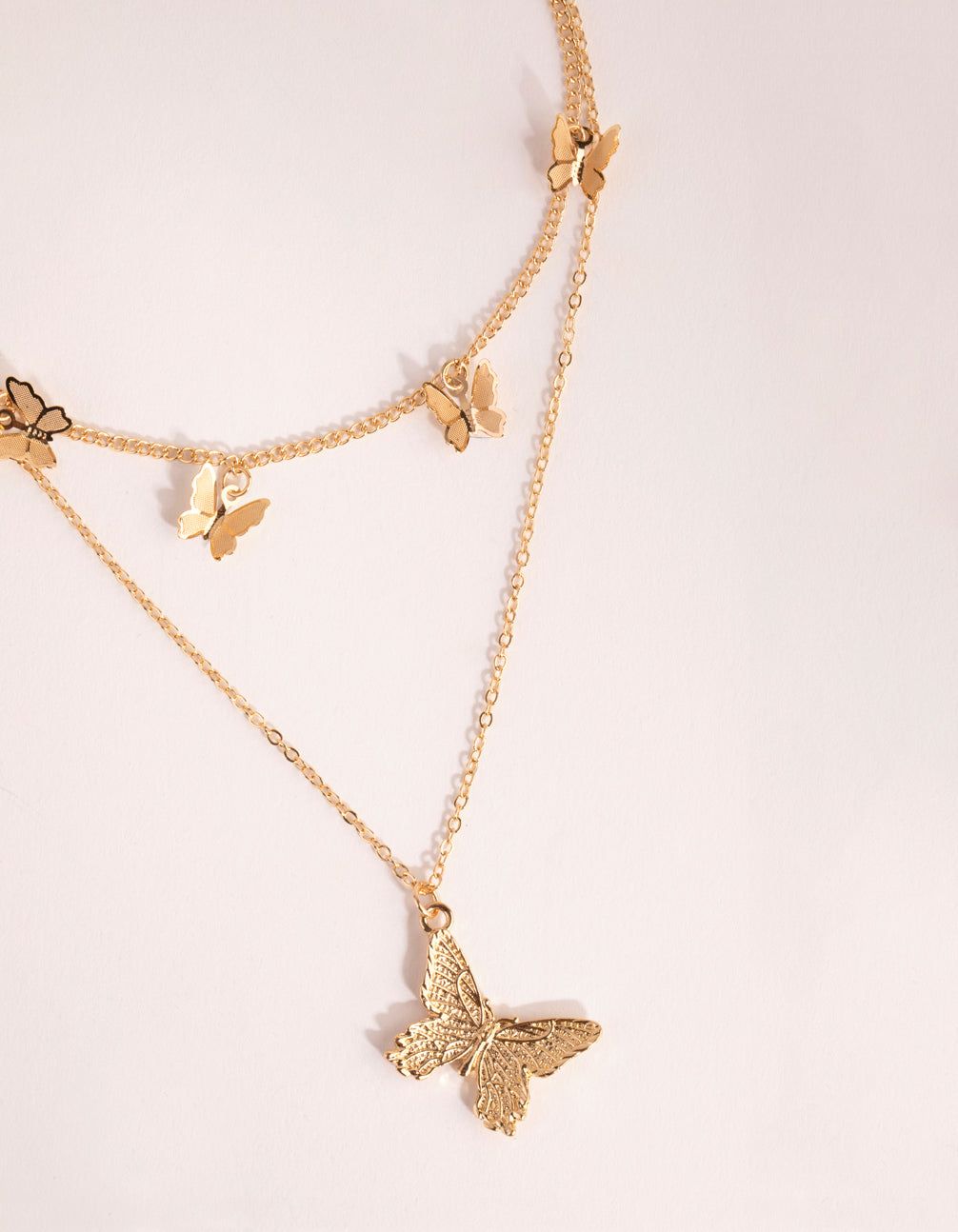 Gold Multi Butterfly Layered Necklace sold by lovisa