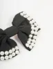 Black & White Short Pearl Bow Barrette Clip sold by lovisa