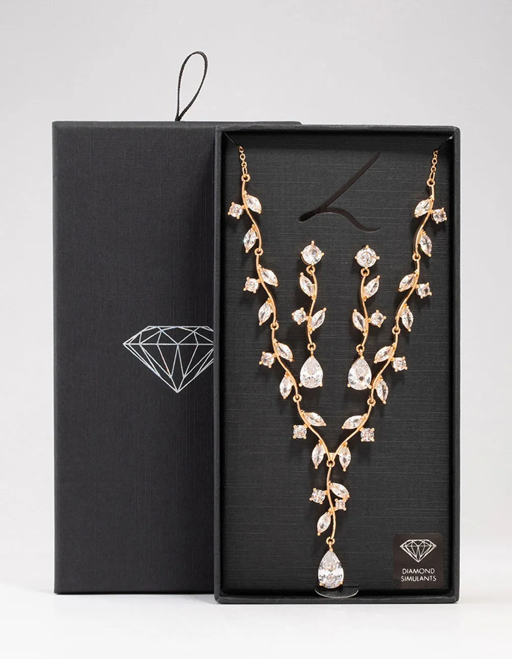 Gold Creeping Crystal Vine Necklace & Earrings Set sold by lovisa