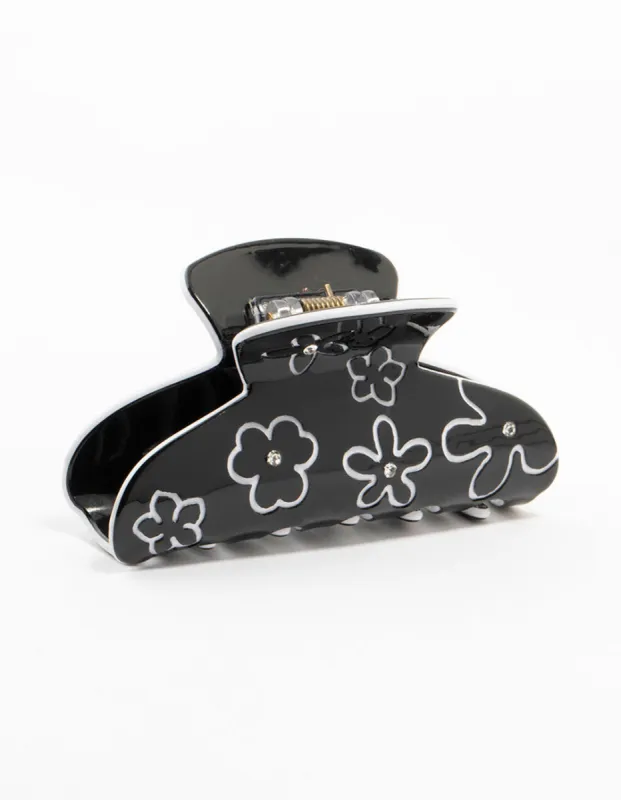 Black & White  Flower Outline Claw Clip sold by lovisa