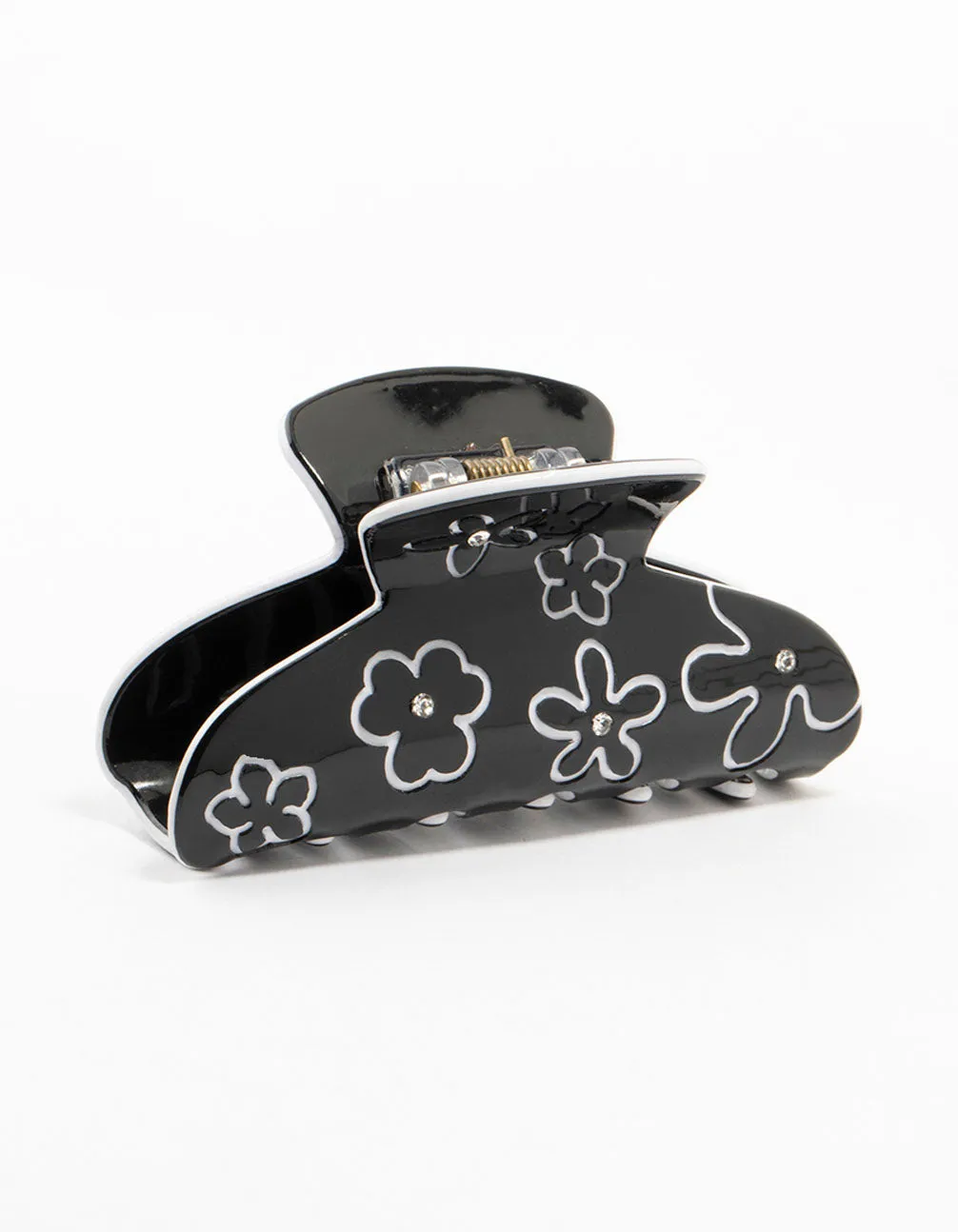 Black & White Flower Outline Claw Clip sold by lovisa